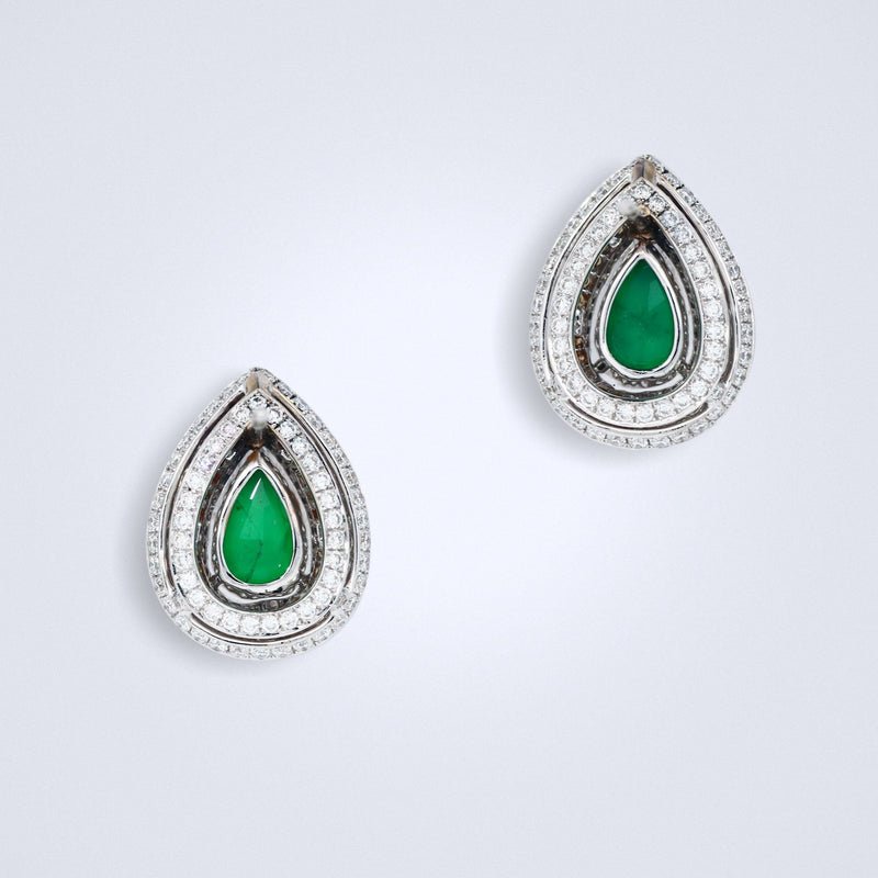 glamorous emerald diamond studs