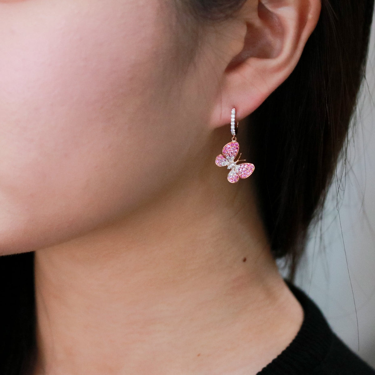 Dancing Butterflies sapphire earrings showcasing elegant butterfly designs embellished with vivid blue sapphires in a graceful luxurious style