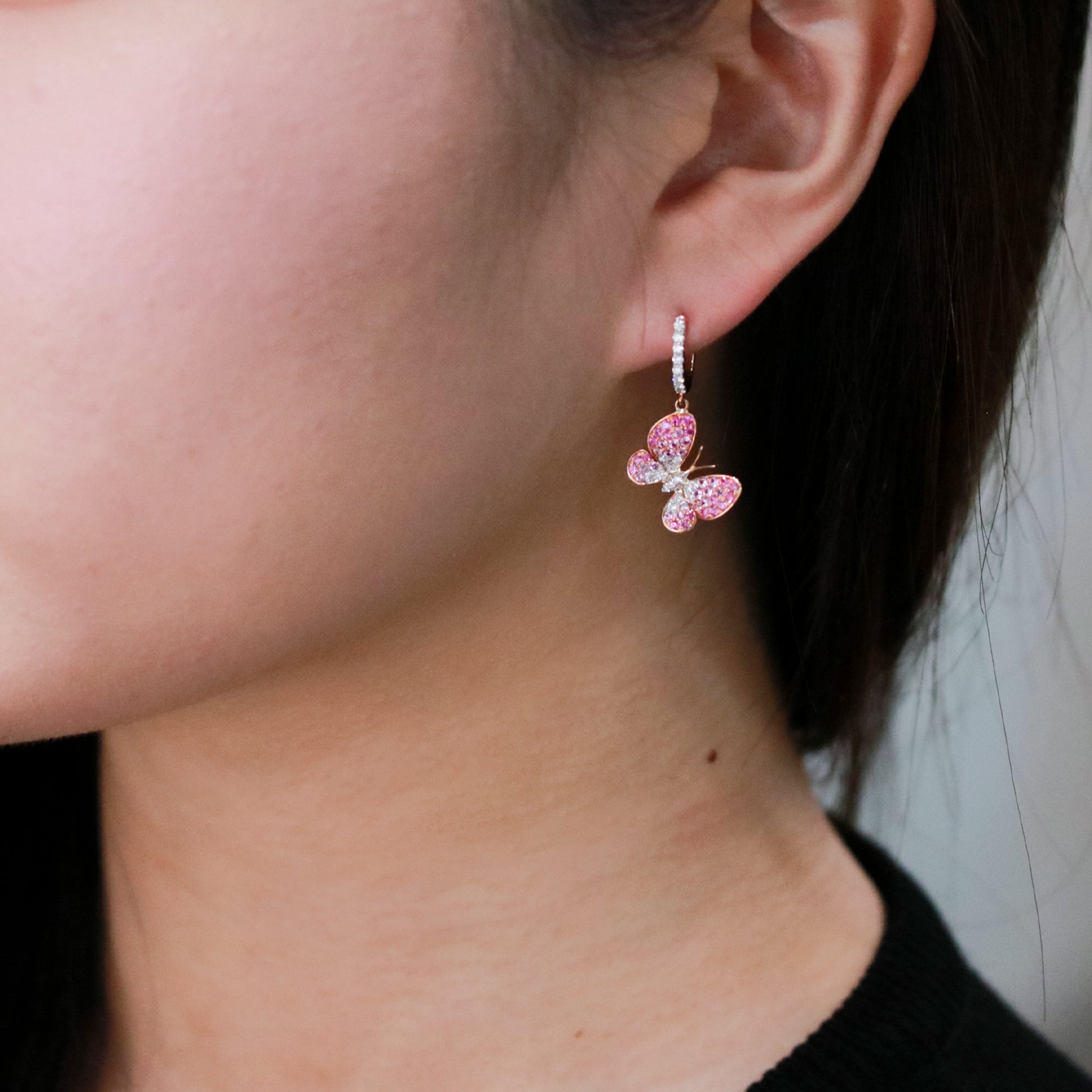 Dancing Butterflies sapphire earrings showcasing elegant butterfly designs embellished with vivid blue sapphires in a graceful luxurious style