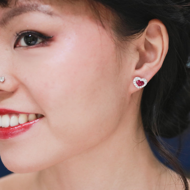 little ruby heart diamond earrings modeled