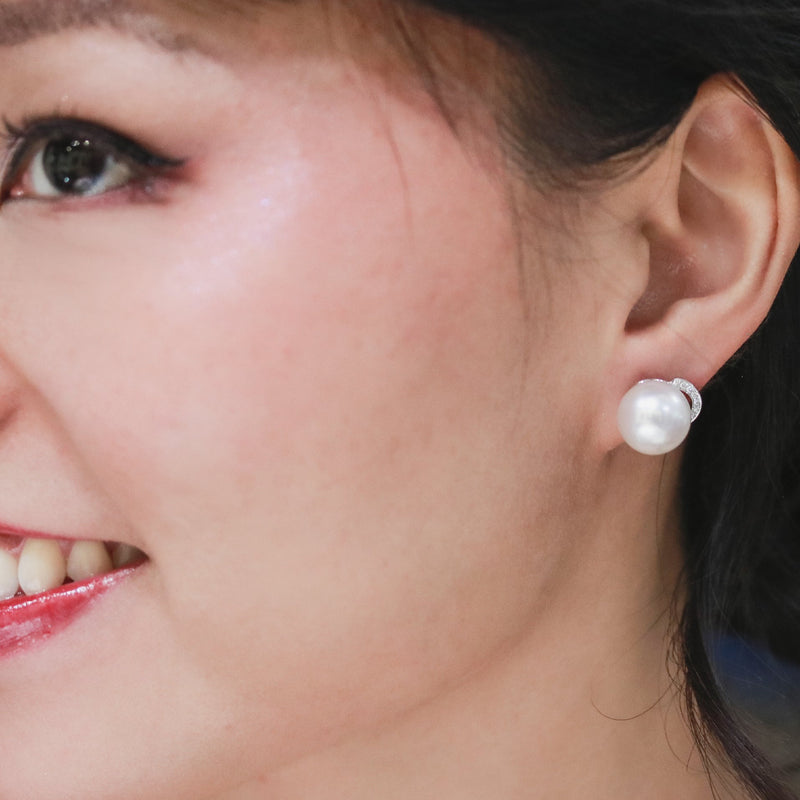 pearl heart diamond earrings modeled