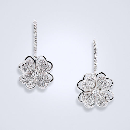 delicate dangling clover diamond earrings