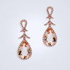 blushing peach morganite dangling diamond earrings