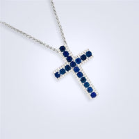 Elegant Sapphire Diamond Cross