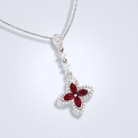 red ruby diamond pendant in an ixora shape design