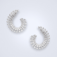 Nebula Diamond Earrings - Benny's Gems Creations 18K White gold diamond earrings in a spiral like shape 