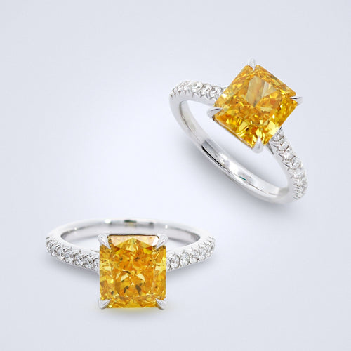 fancy vivid Orangy yellow diamond ring