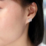 petite butterflyw diamond earrings-modeled