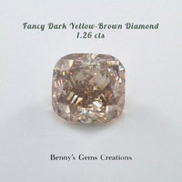 1.26cts fancy dark yellow brown diamond