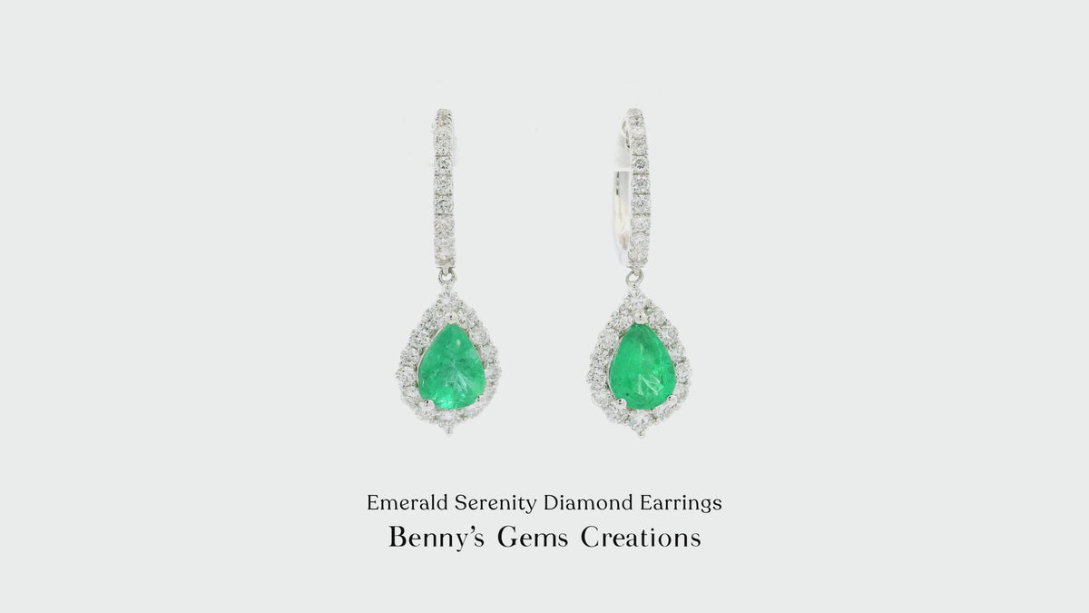 Emerald Serenity Diamond Earrings with vivid green emeralds and sparkling diamonds in elegant white gold setting