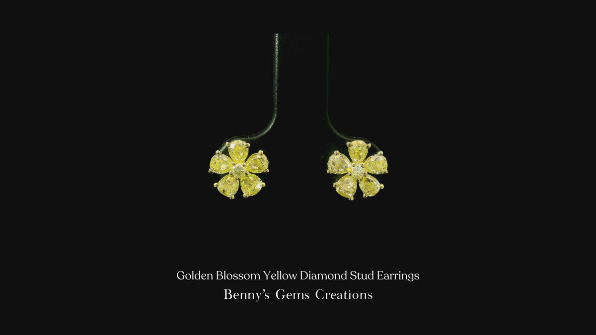 Golden Blossom Yellow Diamond Stud Earrings featuring radiant yellow diamonds in a floral-inspired design, accented with shimmering diamonds for a warm, elegant, and timeless look