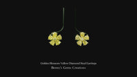 Golden Blossom Yellow Diamond Stud Earrings featuring radiant yellow diamonds in a floral-inspired design, accented with shimmering diamonds for a warm, elegant, and timeless look