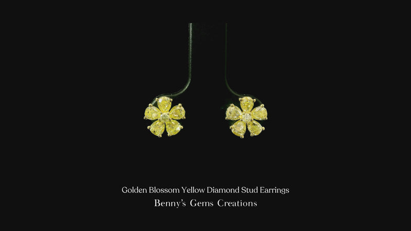Golden Blossom Yellow Diamond Stud Earrings featuring radiant yellow diamonds in a floral-inspired design, accented with shimmering diamonds for a warm, elegant, and timeless look