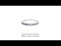 Light blue sapphire stack ring featuring delicate design with shimmering pastel blue sapphires