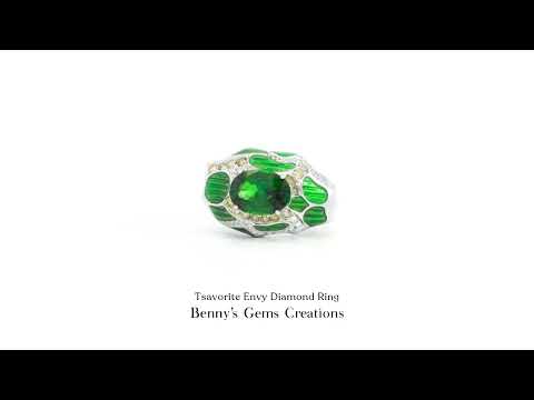 18K gold men’s tsavorite and diamond ring featuring 1 tsavorite (2.64 ct), 15 yellow diamonds (0.307 ct total) and 32 white diamonds (0.168 ct total).
