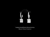 Dangling Emerald Illusion Diamond Earrings featuring emeralds with illusion-set diamonds in classic design