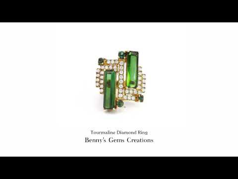 Yellow gold ring featuring a vibrant green tourmaline accented with sparkling diamonds