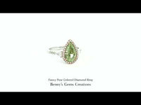 Fancy Pear Colored Diamond Ring featuring a pear-shaped center stone in timeless design