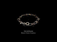 Chic gold bracelet featuring a sleek and modern design with a polished finish, perfect for elegant everyday wear.