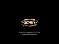 Stackable ring crafted in intertwined yellow and white gold with sparkling diamonds