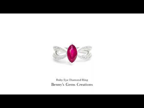 Ruby Eye Diamond Ring featuring a vivid ruby and accent diamonds