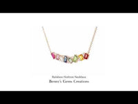 Rainbow Horizon Necklace featuring a vibrant gradient of multicolored gemstones set in an elegant gold design.