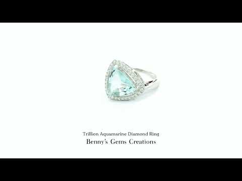 Trillion Aquamarine Diamond Ring accented with sparkling diamonds and icy blue brilliance