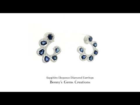 Sapphire Elegance Diamond Earrings with deep blue sapphires and sparkling diamonds in white gold setting