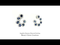 Sapphire Elegance Diamond Earrings with deep blue sapphires and sparkling diamonds in white gold setting