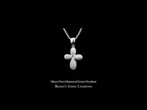18K white gold pave cross pendant set with 102 diamonds (0.52 ct total), chain sold separately.