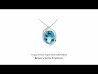Tropical Oasis Topaz Diamond Pendant with vibrant blue topaz centerpiece and  sparkling diamond accents for sophisticated wear