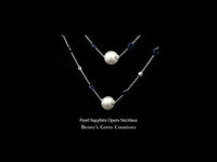 Elegant opera-length necklace featuring lustrous pearls and brilliant sapphires
