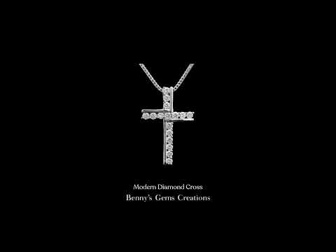 18K white gold diamond pendant set with 16 diamonds (0.82 ct total), chain sold separately.