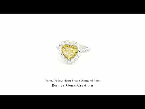 Fancy Yellow Heart Shape Diamond Ring with brilliant white diamond accents in elegant white gold setting