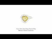 Fancy Yellow Heart Shape Diamond Ring with brilliant white diamond accents in elegant white gold setting