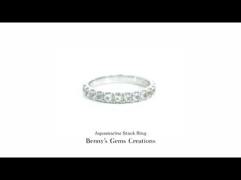 18K white gold aquamarine stack ring featuring 13 aquamarines (0.518ct total).