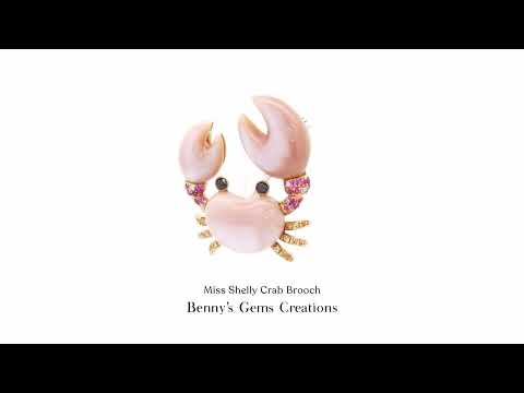 Miss Shelly Crab Brooch adorned with pink and yellow sapphires and sparkling diamonds – elegant ocean-inspired jewelry with vibrant gemstone accents.