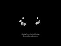 Floating Flower Diamond Earrings with delicate floral design and sparkling diamonds