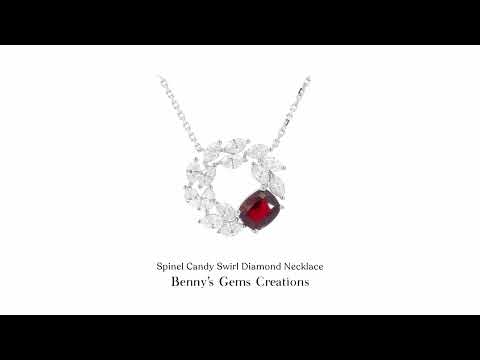 Spinel Candy Swirl Diamond Necklace featuring a vivid red spinel centerpiece surrounded by a spiral of sparkling marquise-cut diamonds set in elegant white gold.