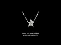 Brilliant Star Diamond Necklace featuring a dazzling star-inspired design adorned with round-cut diamonds, radiating brilliance and timeless elegance.
