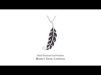 Black Diamond Leaf White Gold Pendant featuring black diamond leaf design and sparkling diamonds
