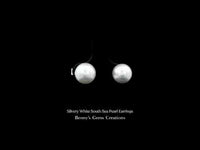 Elegant and timeless South Sea Pearl earrings featuring silvery white natural pearls
