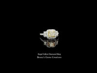 Regal Yellow Diamond Ring featuring a vibrant yellow center stone in fine jewelry setting