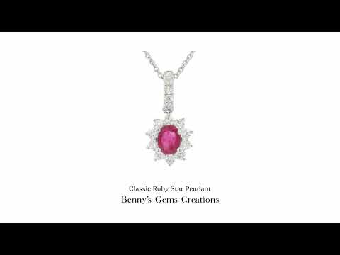 Classic Ruby Star Pendant featuring a natural star ruby with a distinct asterism, elegantly set in a timeless design accented with sparkling diamonds.