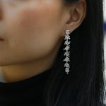 dual wear diamond earrings modeled