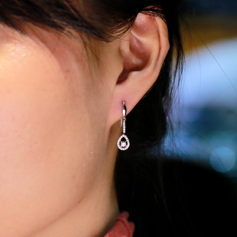 dainty dangling diamond earrings
