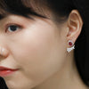 ruby floating fantasy diamond earrings modeled